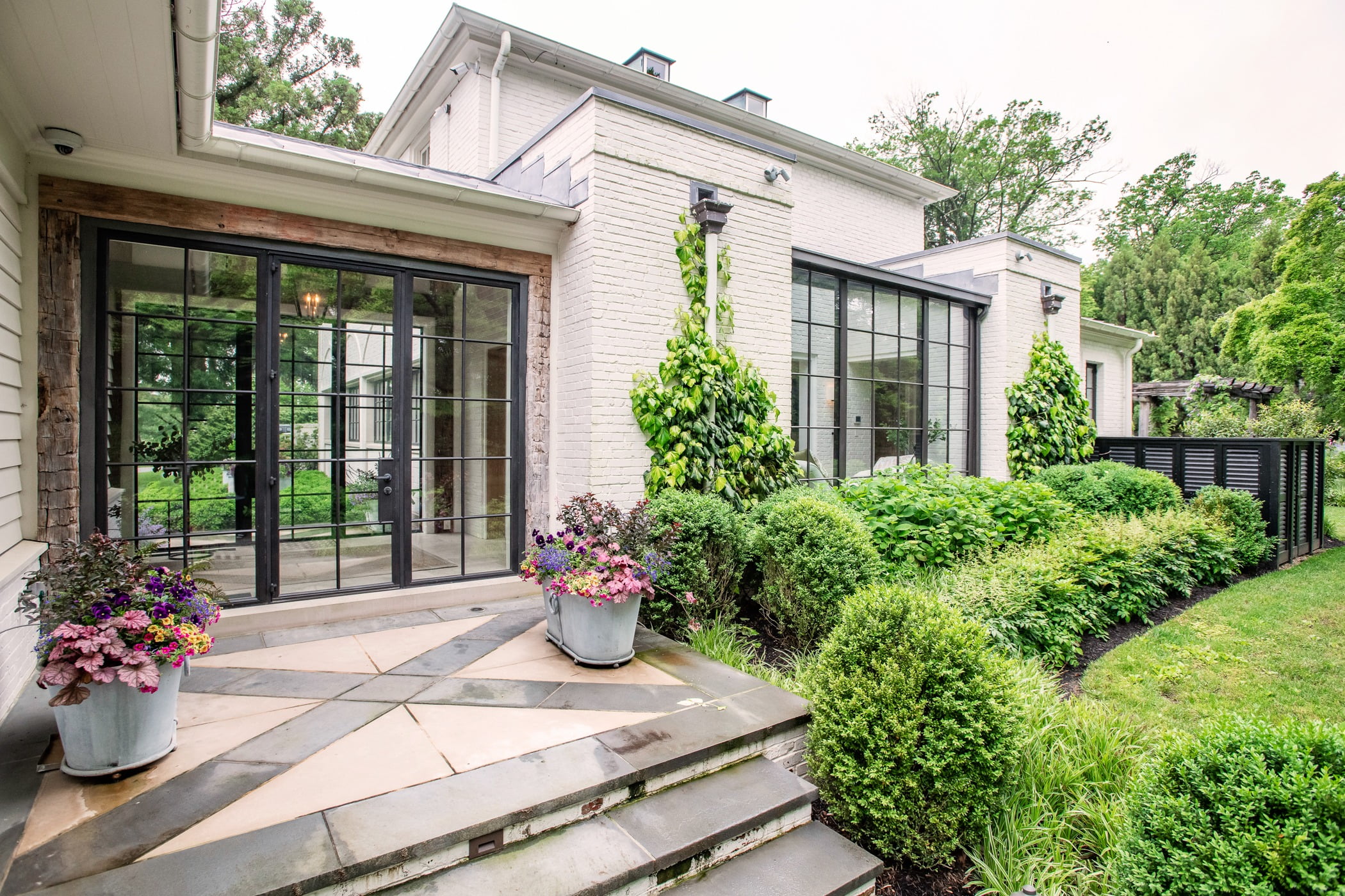 Shattuck house rear patio and shrubbery