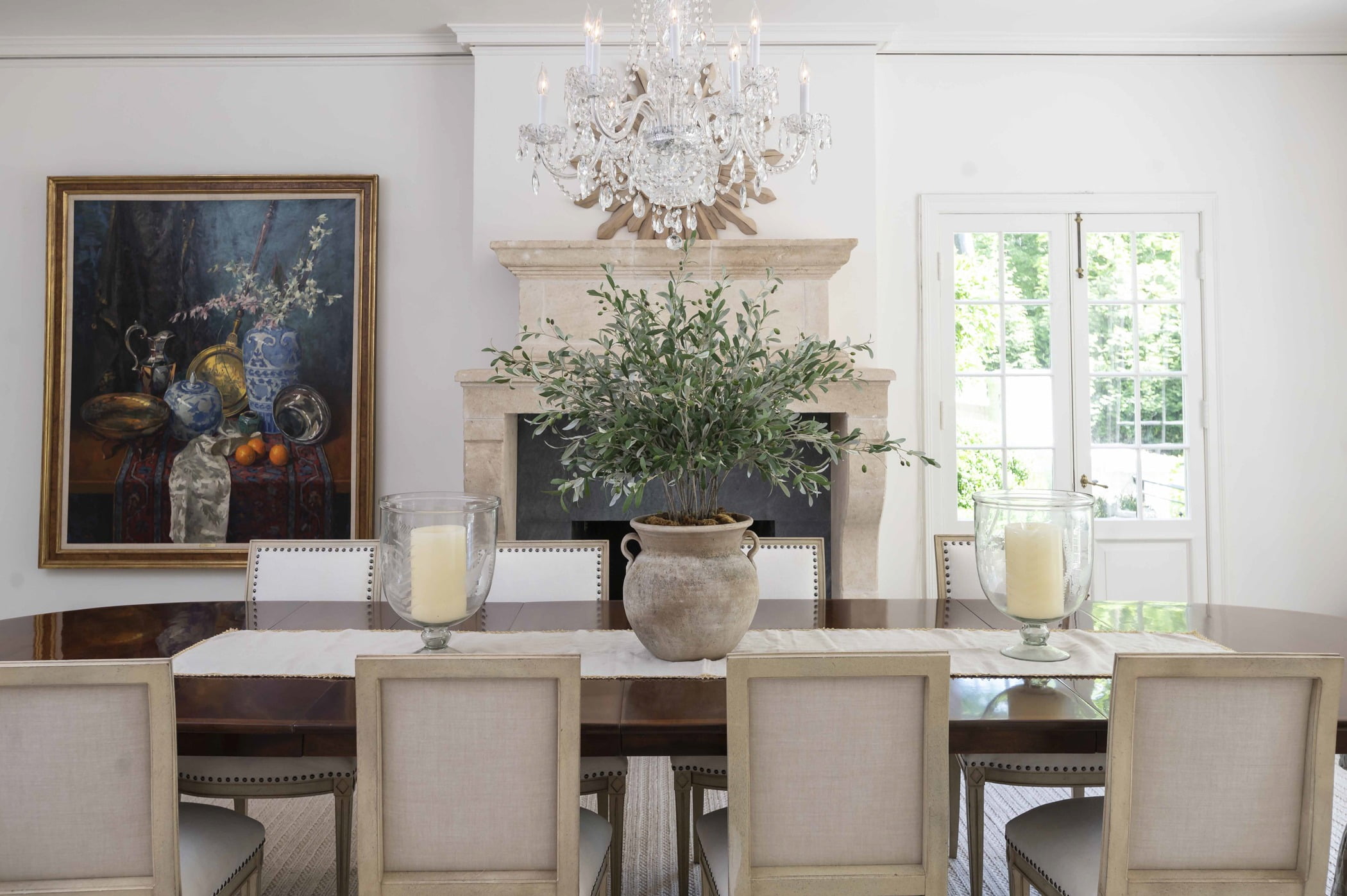 Traditional dining room table and crystal chandelier (Zoomed in)