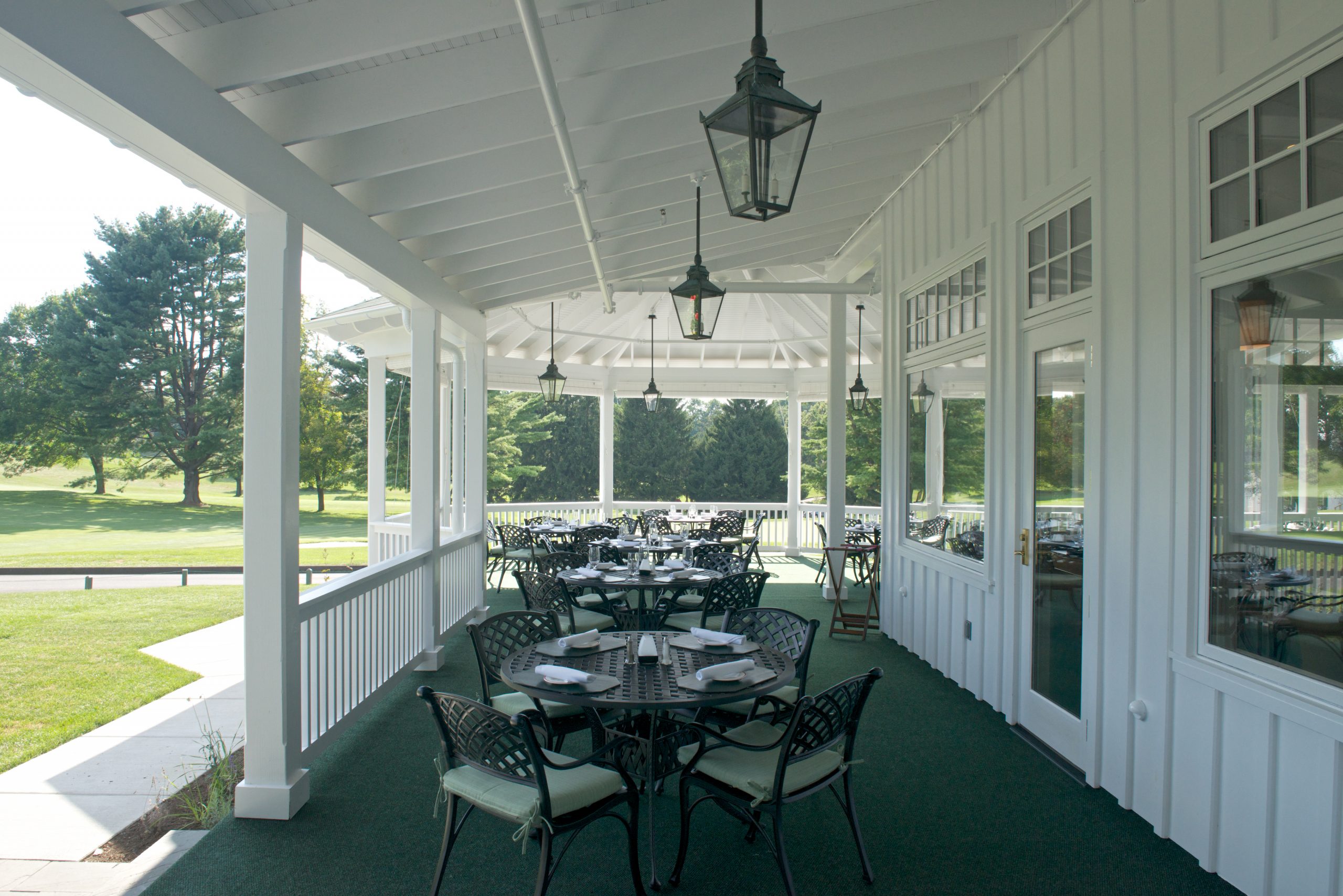 The deck and outdoor seating area at Elkridge Country Club in Baltimore, Maryland renovated by Delbert Adams Construction Group, Commercial Construction division.