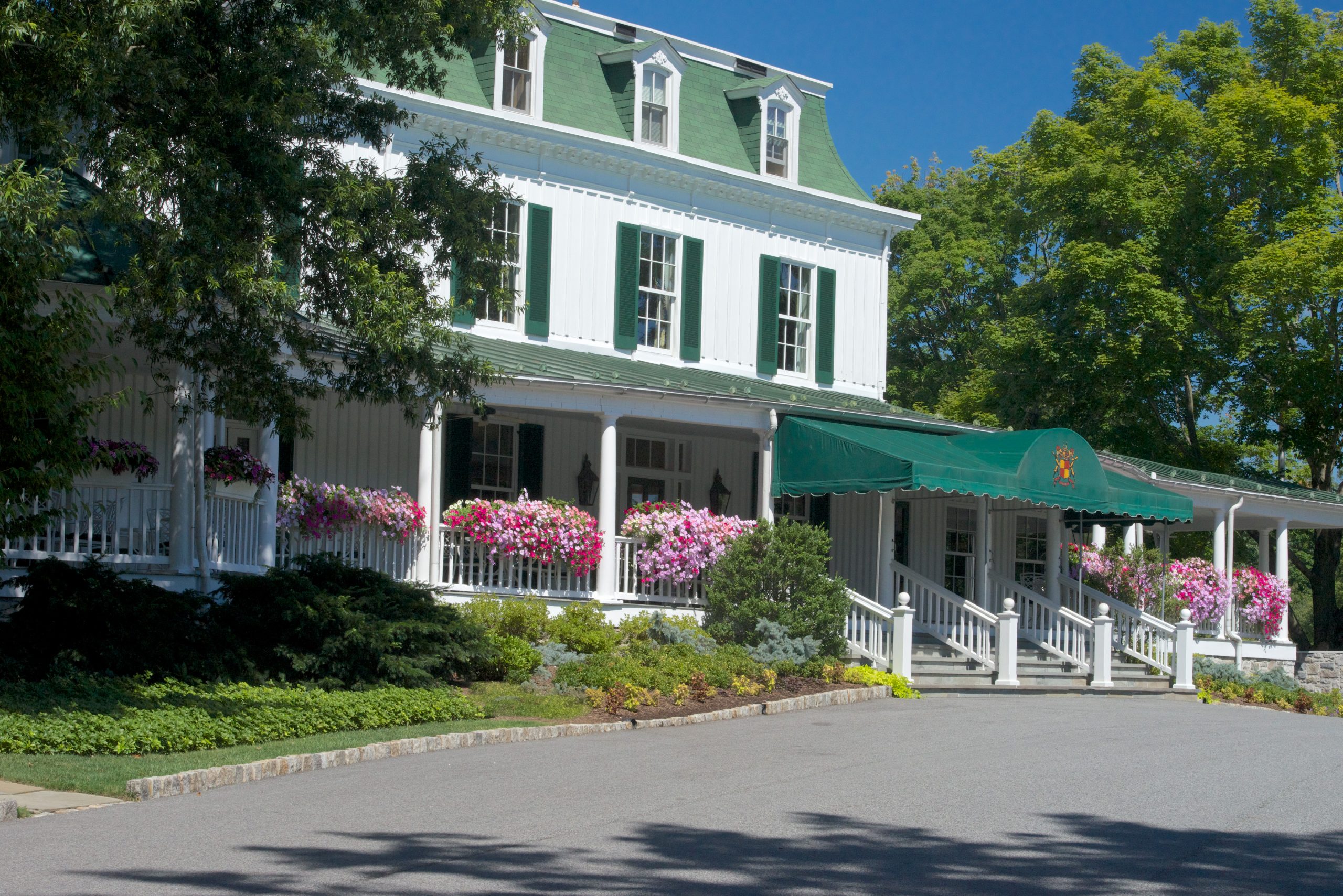 The front entrance of the Elkridge Country Club in Baltimore, Maryland renovated by Delbert Adams Construction Group, Commercial Construction division.